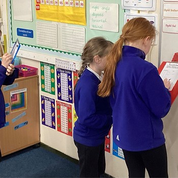 students working with clip boards